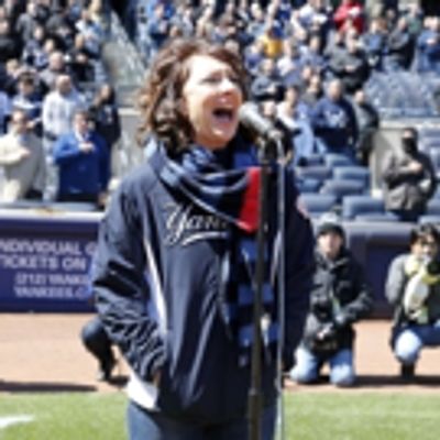 Photo Flash: BRIGHT STAR's Carmen Cusack Sings the National Anthem for Yankees' Opening Day